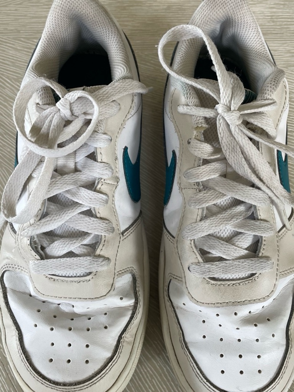 Nike Kids White Sneakers with Teal Swoosh